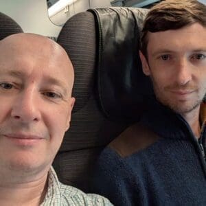 Kenny Smith Steve Laws on train to Paris