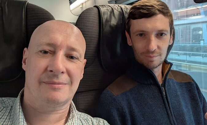 Kenny Smith Steve Laws on train to Paris