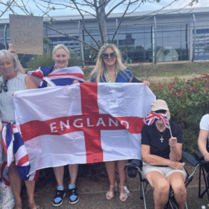 Alison Sheridan wearing council lanyard at anti-migrant demo