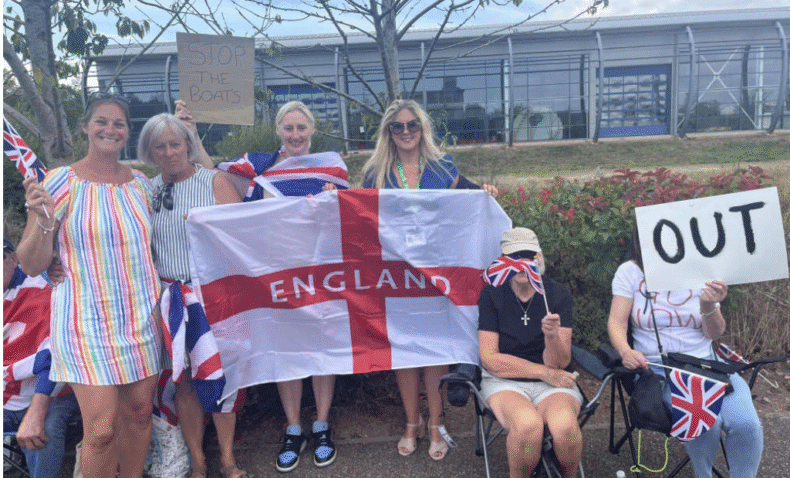 Alison Sheridan wearing council lanyard at anti-migrant demo