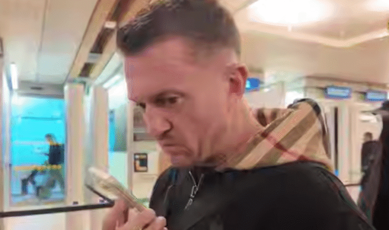 Tommy Robinson being told he has to pay £103,000