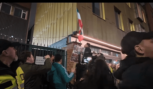 Flags being fixed to Shia mosque manchester