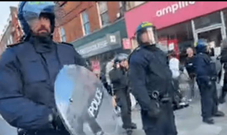 Riot police at Epsom 2026