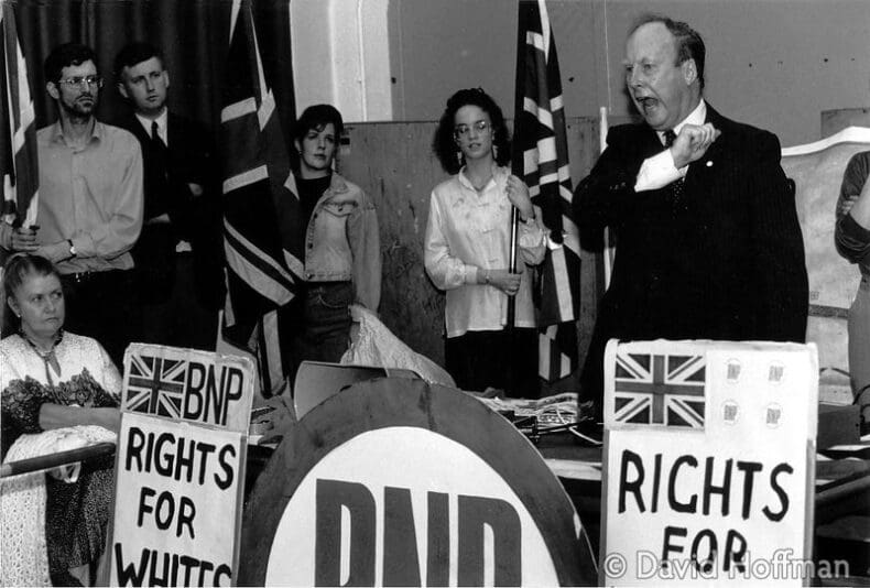 John Tyndall, BNP organiser speaking at pre election rally, Bethnal Green, East London. From left at back: John Morse, Ken Walsh. Seated: Valerie Tyndall. Autumn 1990